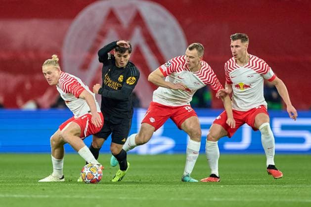 13 02 2024, Football, Men, Champions League, Round of 16, 2023 2024, First leg, RB Leipzig Real Madrid f l n r Xaver Schlager 24, RB Leipzig , Brahim Diaz 21, Real Madrid , Lukas Klostermann 16, RB Leipzig , Willi Orban 4, RB Leipzig , Action, Battle for Bal, Defensive Leipzig Red Bull Arena Saxony Germany