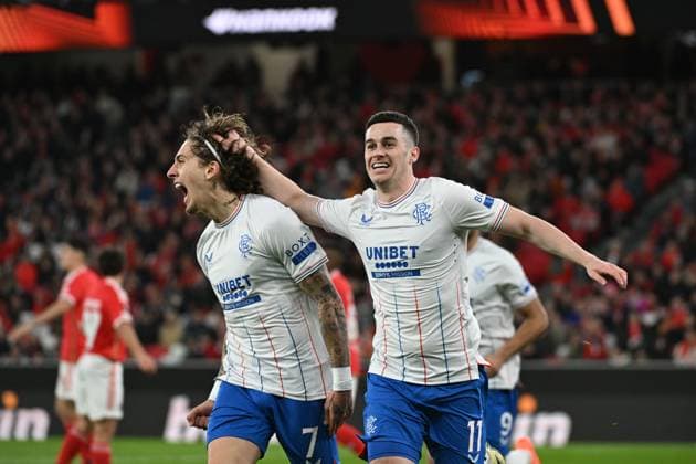 Sport Bilder des Tages Tom Lawrence of Rangers celebrates their goal to make it 0-1 Benfica v Rangers, UEFA Europa League, Round of 16, First Leg, Football, Estadio da Luz, Lisbon, Portugal - 07 Mar 2024 EDITORIAL USE ONLY No use with unauthorised audio, video, data, fixture lists, club league logos or live services. Online in-match use limited to 120 images, no video emulation. No use in betting, games or single club league player publications. Copyright: xZedxJameson Shutterstockx 14373669ab