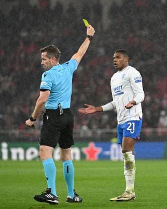 Referee Tobias Stieler cautions Dujon Sterling of Rangers Benfica v Rangers, UEFA Europa League, Round of 16, First Leg, Football, Estadio da Luz, Lisbon, Portugal - 07 Mar 2024 EDITORIAL USE ONLY No use with unauthorised audio, video, data, fixture lists, club league logos or live services. Online in-match use limited to 120 images, no video emulation. No use in betting, games or single club league player publications. Copyright: xZedxJameson Shutterstockx 14373669ar