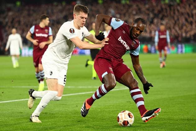 Lucas Paqueta of West Ham United under pressure from Matthias Ginter of SC Freiburg West Ham United v Freiburg, UEFA Europa League, Round of 16, Second Leg, Football, London Stadium, London, UK - 14 Mar 2024 EDITORIAL USE ONLY No use with unauthorised audio, video, data, fixture lists, club league logos or live services. Online in-match use limited to 120 images, no video emulation. No use in betting, games or single club league player publications. Copyright: xSimonxDael Shutterstockx 14385551s