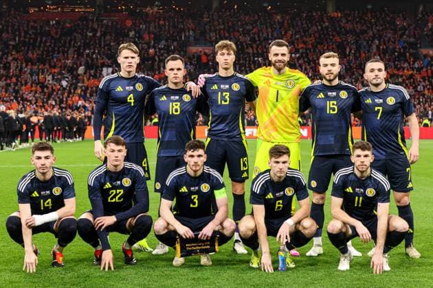 2024-03-22 Netherlands v Scotland - International Friendly, Länderspiel, Nationalmannschaft AMSTERDAM, NETHERLANDS - MARCH 22: Billy Gilmour of Scotland, Scott McTominay of Scotland, Lawrence Shankland of Scotland, Jack Hendry of Scotland, goalkeeper Angus Gunn of Scotland, Ryan Porteous of Scotland, John McGinn of Scotland, Nathan Patterson of Scotland, Andrew Robertson of Scotland, Kieran Tierney of Scotland, Ryan Christie of Scotland posing for a team photo during the International Friendly match between Netherlands and Scotland at Johan Cruijff ArenA on March 22, 2024 in Amsterdam, Netherlands. (Photo by Peter Lous BSR Agency) Amsterdam Netherlands Content not available for redistribution in The Netherlands directly or indirectly through any third parties. Copyright: xBSRxAgencyx