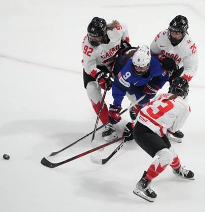 April 8, 2024, Utica, Ny, UNITED STATES: Canada s Danielle Serdachny (92), Jaime Bourbonnais (25) and Kristin O Neill (43) battle with United States Kirsten Simms (9) during second period hockey action at the IIHF Women s World Hockey Championship in Utica, N.Y., Monday, April 8, 2024. Canada News - April 8, 2024 - ZUMAc35_ 20240408_zaf_c35_271 Copyright: xChristinnexMuschix