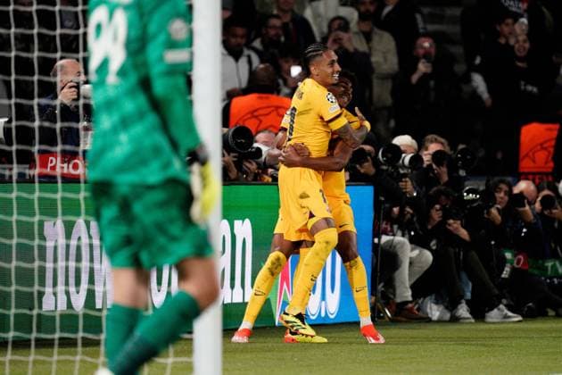 Raphinha of Barcelona puts his side 1-0 ahead Paris Saint-Germain v Barcelona, UEFA Champions League, Quarter Final, First Leg, Football, Parc des Princes, Paris, France - 10 Apr 2024 EDITORIAL USE ONLY No use with unauthorised audio, video, data, fixture lists, club league logos or live services. Online in-match use limited to 120 images, no video emulation. No use in betting, games or single club league player publications. Copyright: xDavexWinter Shutterstockx 14424874ap