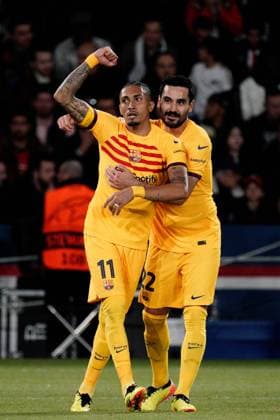 Raphinha of Barcelona is congratulated by Ilkay Gundogan of Barcelona after he puts his side 1-0 ahead Paris Saint-Germain v Barcelona, UEFA Champions League, Quarter Final, First Leg, Football, Parc des Princes, Paris, France - 10 Apr 2024 EDITORIAL USE ONLY No use with unauthorised audio, video, data, fixture lists, club league logos or live services. Online in-match use limited to 120 images, no video emulation. No use in betting, games or single club league player publications. Copyright: xDavexWinter Shutterstockx 14424874ar