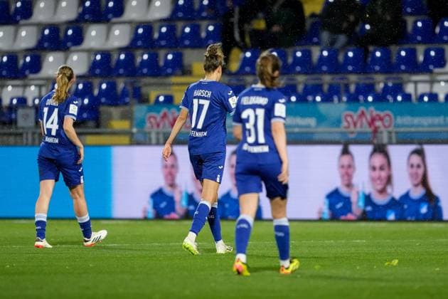 from left Lisa Doorn TSG, 14 , Franziska Harsch TSG, 17 , Jana Feldkamp TSG, 31 , TSG 1899 Hoffenheim players, looking disappointed, disappointment, frustration, disappointed, pessimistic, action, action, Match Scene, 15 04 2024, Sinsheim Hoffenheim Germany , Soccer, Google Pixel Women Bundesliga, TSG 1899 Hoffenheim 1 FC Köln, DFB DFL REGULATIONS PROHIBIT ANY USE OF PHOTOGRAPHS AS IMAGE SEQUENCES AND OR QUASI VIDEO xozx