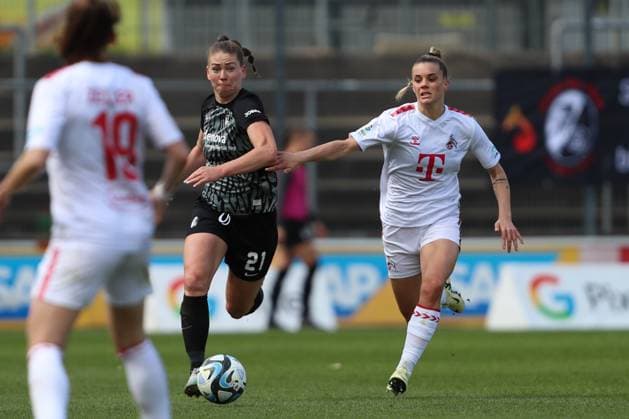 Samantha Steuerwald SC Freiburg and Selina Cerci 1 FC Koeln in a duel, Womens Bundesliga, 1 FC Koeln SC Freiburg, Franz Kremer Stadion on April 21, 2024 in Cologne, Germany Photo by Oliver Kaelke DeFodi Images Samantha Steuerwald SC Freiburg and Selina Cerci 1 FC Koeln battle for the ball, Frauen Bundesliga, 1 FC Koeln SC Freiburg, Franz Kremer Stadion on April 21, 2024 in Cologne, Germany Photo by Oliver Kaelke DeFodi Images Defodi 678 2024 04 121 OK FCKSCF 1358 Defodi-678