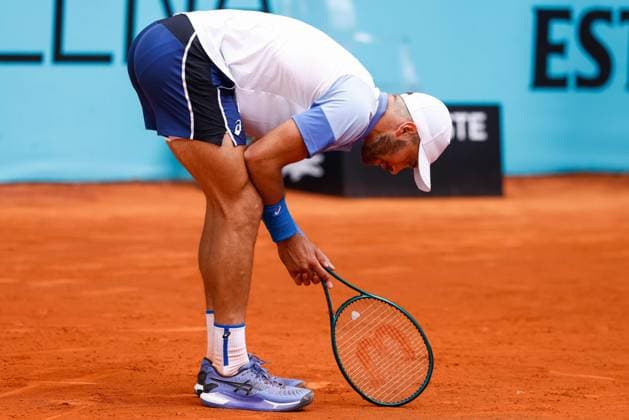 April 24, 2024, Madrid, Madrid, SPAIN: Borna Coric of Croatia gestures against Benjamin Hassan of Germany during the Mutua Madrid Open 2024, ATP, Tennis Herren Masters 1000 and WTA, Tennis Damen 1000, tournament celebrated at Caja Magica on April 24, 2024 in Madrid, Spain. Madrid SPAIN - ZUMAa181 20240424_zaa_a181_077 Copyright: xIrinaxR.xHipolitox