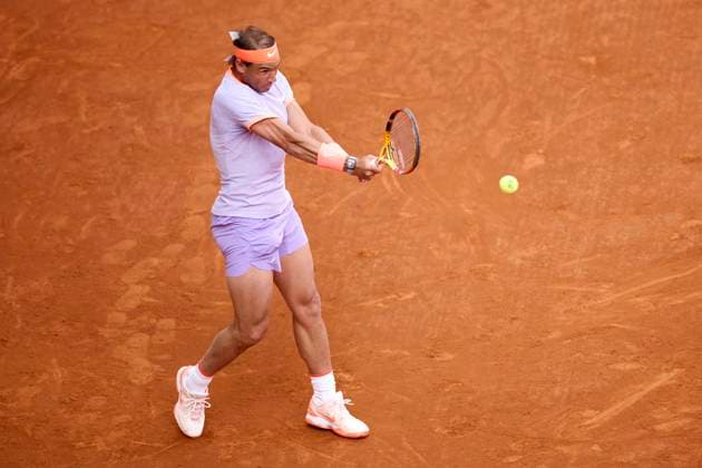 Mutua Madrid Open - Day Four Rafael Nadal of Spain returns a shot against Darwin Blanch of United States during day four of the Mutua Madrid Open 2024 at Caja Magica on April 25, 2024, in Madrid, Spain. Madrid Caja Magica Madrid Spain RL_MMO24_01275 Copyright: xRicardoxLarreinax