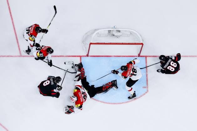 Ice hockey, Eishockey - IIHF WC 2024 PRAGUE,CZECH REPUBLIC,14.MAY.24 - ICE HOCKEY - IIHF Ice Hockey World Championship, WM, Weltmeisterschaft 2024, group stage, Austria vs Canada. Image shows Nico Brunner, Marco Rossi, David Madlener, Paul Stapelfeldt (AUT), Michael Bunting and Andrew Mangiapane (CAN). Keywords: roofcam. GEPAxpictures xDanielxGoetzhaber