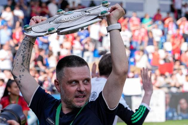 Alexander Straus coach, head coach, FCB with the bowl, single photo, single photo, cheering, at the award ceremony after the game with the championship bowl, with trophy, with the cup, honoring the German champion, after winning the championship, German champion 2023 24 in the Google Pixel Womens Bundesliga, joy of victory, winner, winner, winning the German championship, German champion, German champion, rejoice, rejoicing, cheering, cheerful, joy, optimistic, positive, highlight, champion celebration, action, action, 20 05 2024, Sinsheim Hoffenheim Germany , football, Google Pixel Womens Bundesliga, TSG 1899 Hoffenheim FC Bayern Munich, DFB DFL REGULATIONS PROHIBIT ANY USE OF PHOTOGRAPHS AS IMAGE SEQUENCES AND OR QUASI VIDEO xozx