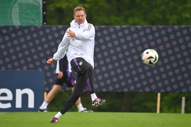 National coach Julian NAGELSMANN GER shot, shoots, action, single action, single image, cropped image, full body shot, whole figure training at the Golf Resort Weimarer Land, training ground German national football team, football training camp in Blankenhain Thuringia on 27 05 2024,