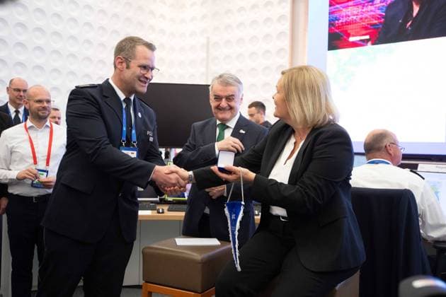 Nancy FAESER, Federal Minister of the Interior, SPD, and Herbert REUL, CDU, Minister of the Interior, Minister of the Interior of North Rhine-Westphalia, visit the IPCC, Oliver STRUDTHOFF, left, Head of the IPCC, presents a gift, Opening of the IPCC International Police cooperation Center for the UEFA European Football Championship 2024, , Neuss, on 10 06 2024 Â