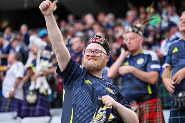 Soccer fans, Scotland, EM 2024, stadium, fan atmosphere, Scotland scarf, blue jerseys, Scottish flags, enthusiastic fans, sporting enthusiasm, community, support, national pride, EM event, cheering, passionate supporters, celebratory mood, public viewing, international visitors, football, UEFA, European Championship, Group A 2024, Germany vs Scotland, 14 06 2024, Munich Football Arena, Munich, Germany Munich Football Arena Bayern Germany Copyright: xGrantxHubbsx