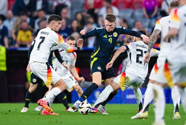 Scott McTominay Scotland , Kai Havertz Germany and Ilkay Guendogan Germany battle for the ball, UEFA EURO 2024 Group A, Germany vs Scotland, Munich Football Arena on June 14, 2024 in Munich, Germany Photo by Silas Schueller DeFodi Images Scott McTominay Scotland , Kai Havertz Germany and Ilkay Guendogan Germany battle for the ball, UEFA EURO 2024 Group A, Germany vs Scotland, Munich Football Arena on June 14, 2024 in Munich, Germany Photo by Silas Schueller DeFodi Images Defodi 0580999742st Defodi-738