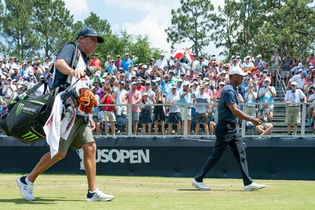June 14, 2024, Pinehurst, North Carolina, USA: Tiger Woods of Jupiter, Florida, and his caddie, Lance Bennett, walk off the sixth tee during Friday s second round for the 124th U.S. Open, June 14, 2024, at Pinehurst Resort & Country Club (Course No. 2) in Pinehurst, North Carolina. Pinehurst USA - ZUMAh97_ 20240614_fap_h97_001 Copyright: xTimothyxL.xHalex