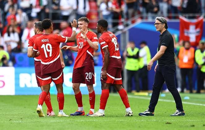 Michel Aebischer of Switzerland celebrates scoring to make it 2-0 with Dan Ndoye of Switzerland, Kwadwo Duah of Switzerland and Switzerland manager Murat Yakin Hungary v Switzerland, UEFA European Championship, EM, Europameisterschaft 2024, Group A, Football, Cologne Stadium, Cologne, Germany, 15 Jun 2024 EDITORIAL USE ONLY No use with unauthorised audio, video, data, fixture lists, club league logos or live services. Online in-match use limited to 120 images, no video emulation. No use in betting, games or single club league player publications. Copyright: xMichaelxZemanek Shutterstockx 14539265au