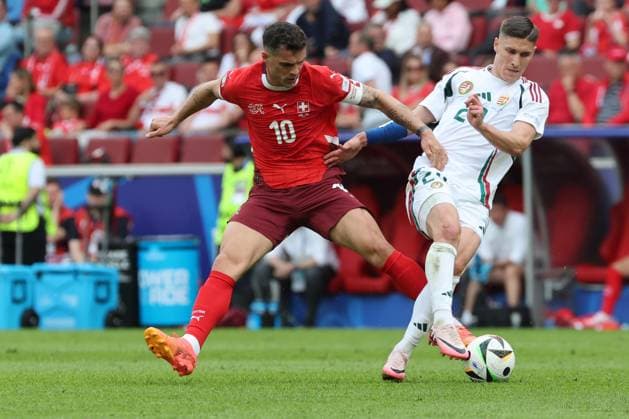 duel Granit Xhaka Switzerland, No. 10 with Endre Botka Hungary, No. 21 , preliminary round match M02, HUN SUI, , European Football Championship, Hungary vs Switzerland, European Football Championship, Hungary vs Swiss, Cologne, Cologne, 15 06 2024,