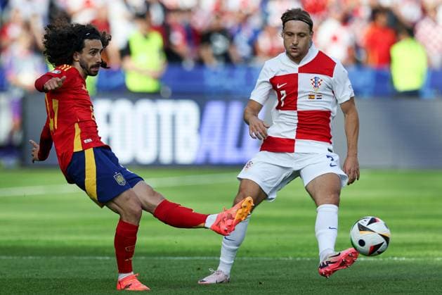 Marc Cucurella of Spain under pressure from Lovro Majer of Croatia Spain v Croatia, UEFA European Championship, EM, Europameisterschaft 2024, Group B, Football, Olympiastadion, Berlin, Germany, 15 Jun 2024 EDITORIAL USE ONLY No use with unauthorised audio, video, data, fixture lists, club league logos or live services. Online in-match use limited to 120 images, no video emulation. No use in betting, games or single club league player publications. Copyright: xMattxWest Shutterstockx 14539284u
