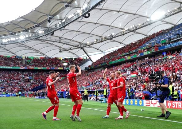 Denmark celebrate as Christian Eriksen of Denmark scores to make it 0-1 Slovenia v Denmark, UEFA European Championship, EM, Europameisterschaft 2024, Group C, Football, Stuttgart Arena, Stuttgart, Germany, 16 Jun 2024 EDITORIAL USE ONLY No use with unauthorised audio, video, data, fixture lists, club league logos or live services. Online in-match use limited to 120 images, no video emulation. No use in betting, games or single club league player publications. Copyright: xMichaelxZemanek Shutterstockx 14539399ca