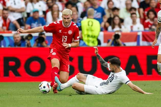 16 06 2024, Football, European Championship, Slovenia Denmark, GER, Stuttgart, Football Arena, picture from left Jonas Wind Denmark, 19 , Petar Stojanovic Slovenia, 20 , duel, action, fight, fights for the ball, Copyright: HMBxMedia xHeikoxBecker