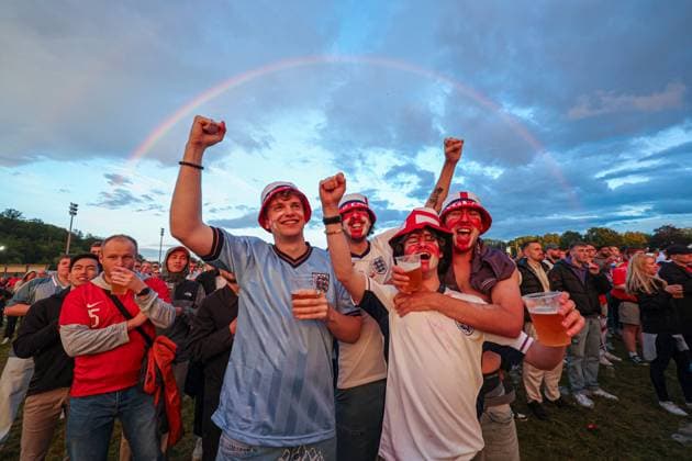 Sport Bilder des Tages England fans celebrate the 1st goal scored by Jude Bellingham in the fan zone at Trabrennbahn, Gelsenkirchen, Germany as a rainbow appears overhead Serbia v England, UEFA European Championship, EM, Europameisterschaft 2024, Group C, Football, Arena Aufschalke, Gelsenkirchen, Germany - 16 Jun 2024 EDITORIAL USE ONLY No use with unauthorised audio, video, data, fixture lists, club league logos or live services. Online in-match use limited to 120 images, no video emulation. No use in betting, games or single club league player publications. Copyright: xPaulxCurrie Shutterstockx 14541951eh