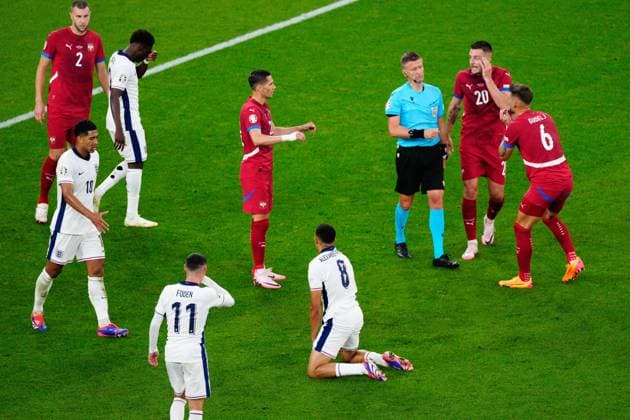 Serbia players react to referee Daniele Orsato gives a free kick to England Serbia v England, UEFA European Championship, EM, Europameisterschaft 2024, Group C, Football, Arena Aufschalke, Gelsenkirchen, Germany, 16 Jun 2024 EDITORIAL USE ONLY No use with unauthorised audio, video, data, fixture lists, club league logos or live services. Online in-match use limited to 120 images, no video emulation. No use in betting, games or single club league player publications. Copyright: xDavexShopland Shutterstockx 14539403aq