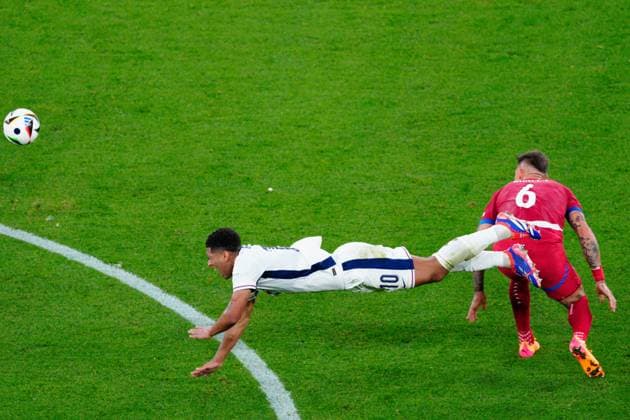 Jude Bellingham of England and Nemanja Gudelj of Serbia Serbia v England, UEFA European Championship, EM, Europameisterschaft 2024, Group C, Football, Arena Aufschalke, Gelsenkirchen, Germany, 16 Jun 2024 EDITORIAL USE ONLY No use with unauthorised audio, video, data, fixture lists, club league logos or live services. Online in-match use limited to 120 images, no video emulation. No use in betting, games or single club league player publications. Copyright: xDavexShopland Shutterstockx 14539403at