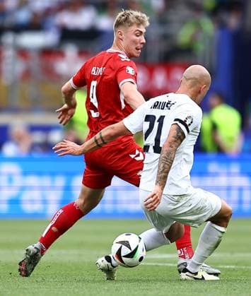 Rasmus Hojlund of Denmark and Vanja Drkusic of Slovenia Slovenia v Denmark, UEFA European Championship, EM, Europameisterschaft 2024, Group C, Football, Stuttgart Arena, Stuttgart, Germany, 16 Jun 2024 EDITORIAL USE ONLY No use with unauthorised audio, video, data, fixture lists, club league logos or live services. Online in-match use limited to 120 images, no video emulation. No use in betting, games or single club league player publications. Copyright: xMichaelxZemanek Shutterstockx 14539399hq