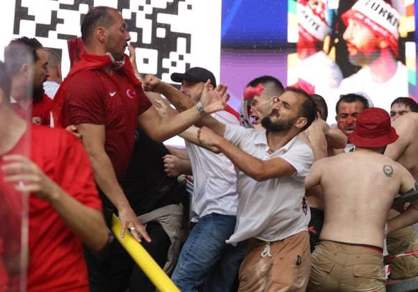 Trouble breaks out between fans in the stands ahead of kick off Turkiye v Georgia, UEFA European Championship, EM, Europameisterschaft 2024, Group F, Football, BVB Stadion, Dortmund, Germany, 18 Jun 2024 EDITORIAL USE ONLY No use with unauthorised audio, video, data, fixture lists, club league logos or live services. Online in-match use limited to 120 images, no video emulation. No use in betting, games or single club league player publications. Copyright: xPaulxCurrie Shutterstockx 14543470ad