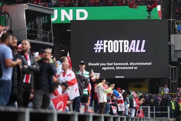 The big screen shows an anti discrimination message ahead of kick off Turkiye v Georgia, UEFA European Championship, EM, Europameisterschaft 2024, Group F, Football, BVB Stadion, Dortmund, Germany, 18 Jun 2024 EDITORIAL USE ONLY No use with unauthorised audio, video, data, fixture lists, club league logos or live services. Online in-match use limited to 120 images, no video emulation. No use in betting, games or single club league player publications. Copyright: xPaulxCurrie Shutterstockx 14543470bc