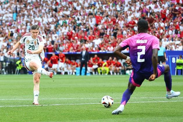 Roland Sallai of Hungary takes a shot at goal but fails to score Germany v Hungary, UEFA European Championship, EM, Europameisterschaft 2024, Group A, Football, Stuttgart Arena, Stuttgart, Germany, 19 Jun 2024 EDITORIAL USE ONLY No use with unauthorised audio, video, data, fixture lists, club league logos or live services. Online in-match use limited to 120 images, no video emulation. No use in betting, games or single club league player publications. Copyright: xMichaelxZemanek Shutterstockx 14543652ak