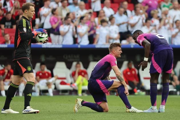 Discussion between Antonio Rüdiger Germany, No. 2 and Toni Kroos Germany, No. 8 in front of goalkeeper Manuel Neuer Germany, No. 1 , Preliminary round match M14, GER HUN, Group A, European Football Championship, Germany vs Hungary, European Football Championship, Germany vs Hungary, Stuttgart, 19 06 2024,