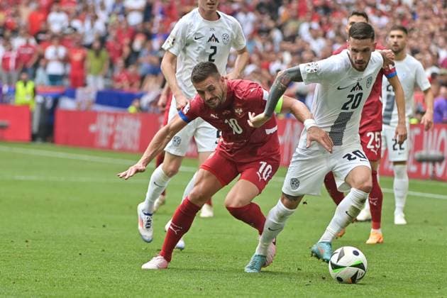 Picture shows from left to right Zan Karnicnik 2, Slovenia , Dusan Tadic 10, Captain Serbia , Petar Stojanovi 20, Slovenia , 20 06 2024, Munich, Football, European Championship, Slovenia Serbia, EVENT REGULATIONS PROHIBIT ANY USE OF PHOTOGRAPHS AS IMAGE SEQUENCES AND OR QUASI VIDEO xklx