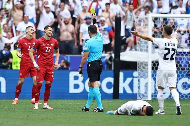 Sasa Lukic of Serbia receives a yellow card Slovenia v Serbia, UEFA European Championship, EM, Europameisterschaft 2024, Group C, Football, Munich Football Arena, Munich, Germany, 20 Jun 2024 EDITORIAL USE ONLY No use with unauthorised audio, video, data, fixture lists, club league logos or live services. Online in-match use limited to 120 images, no video emulation. No use in betting, games or single club league player publications. Copyright: xMichaelxZemanek Shutterstockx 14543659bg