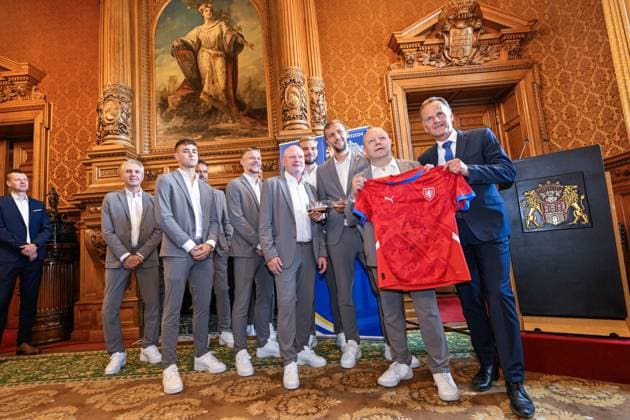 Christoph Holstein, State Councillor of the Ministry of the Interior and Sports of the City of Hamburg (right), receives the Czech national soccer team representatives at the City Hall during the European Championship, EM, Europameisterschaft UEFA EURO, EM, Europameisterschaft,Fussball 2024, in Hamburg, Germany, on June 20, 2024. The ceremony was attended by Czech Football Association President Petr Fousek (second from right), striker Tomas Soucek (third from right), goalkeeper Vitezslav Jaros (fourth from right), coach Ivan Hasek (fifth from right), midfielders Lukas Cerv (sixth from right) and Matej Jurasek (seventh from right) and observer Miroslav Jirkal (eighth from right). (CTKxPhoto VitxSimanek) CTKPhotoP2024062007043 CTKPhotoP2024062007043