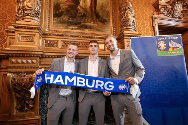 Christoph Holstein, State Councillor of the Ministry of the Interior and Sports of the City of Hamburg (not seen), receives the Czech national soccer team representatives at the City Hall during the European Championship, EM, Europameisterschaft UEFA EURO, EM, Europameisterschaft,Fussball 2024, in Hamburg, Germany, on June 20, 2024. From left: Czech midfielders Lukas Cerv and Matej Jurasek and forward Tomas Soucek. (CTKxPhoto VitxSimanek) CTKPhotoP2024062007337 CTKPhotoP2024062007337