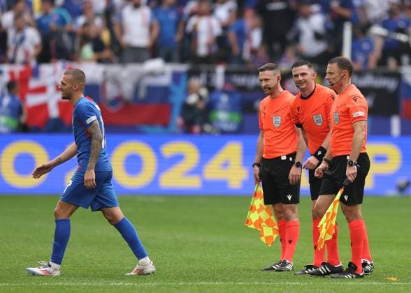Dusseldorf, Germany, 21st June 2024. English Refereeing team Michael Oliver, (c) Dan Cook (l) and Stuart Burt (r) during the UEFA European Championships match at Dusseldorf Arena, Dusseldorf. Picture credit should read: David Klein Sportimage EDITORIAL USE ONLY. No use with unauthorised audio, video, data, fixture lists, club league logos or live services. Online in-match use limited to 120 images, no video emulation. No use in betting, games or single club league player publications. SPI-3201-0039