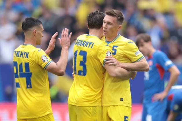 Dusseldorf, Germany, 21st June 2024. Oleksandr Tymchyk, Illia Zabarnyi and Serhiy Sydorchuk of Ukraine celebrate the 2-1 victory following the final whistle of the UEFA European Championships match at Dusseldorf Arena, Dusseldorf. Picture credit should read: Jonathan Moscrop Sportimage EDITORIAL USE ONLY. No use with unauthorised audio, video, data, fixture lists, club league logos or live services. Online in-match use limited to 120 images, no video emulation. No use in betting, games or single club league player publications. SPI-3188-0054