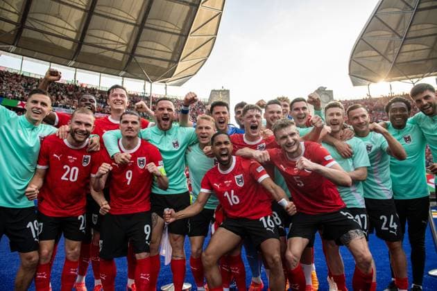 BERLIN, GERMANY - JUNE 21: Phillipp Mwene, Florian Kainz, Marcel Sabitzer, Konrad Laimer, Christoph Baumgartner and other players of Austria celebrates winning the UEFA EURO, EM, Europameisterschaft,Fussball 2024 group stage match between Poland and Austria at Olympiastadion on June 21, 2024 in Berlin, Germany. Photo Sebastian Frej Poland v Austria Copyright: xx
