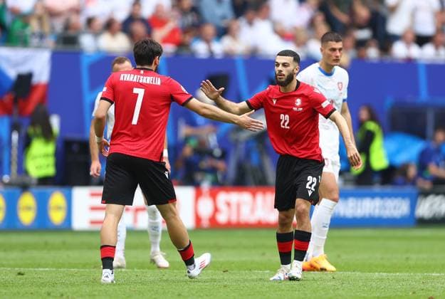 Georges Mikautadze of Georgia celebrates scoring a penalty to make it 1-0 with Khvicha Kvaratskhelia of Georgia Georgia v Czechia, UEFA European Championship, EM, Europameisterschaft 2024, Group F, Football, Volksparkstadion, Hamburg, Germany, 22 Jun 2024 EDITORIAL USE ONLY No use with unauthorised audio, video, data, fixture lists, club league logos or live services. Online in-match use limited to 120 images, no video emulation. No use in betting, games or single club league player publications. Copyright: xKieranxMcManus Shutterstockx 14548025ag