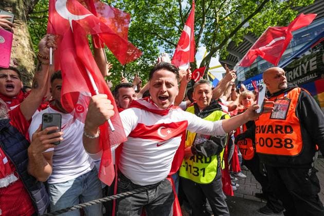 GER, Euro 2024, Group F, Turkey TUR vs Portugal PRT , 22 06 2024, BVB Stadion Dortmund Signal Iduna Park, Dortmund, GER, Euro 2024, Group F, Turkey TUR vs Portugal PRT , In the picture Fans of Turkey TUR celebrate the bus arrival, gestures, facial expressions, emotions, flags, screaming, nordphotoxGmbHxx xChristianxSchulze nph000300