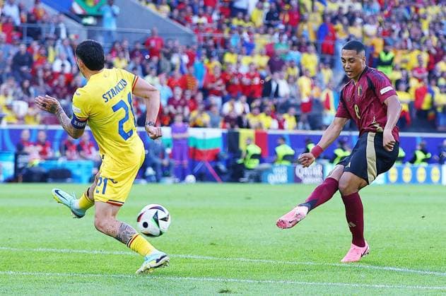 Youri Tielemans of Belgium takes a shot Belgium v Romania, UEFA European Championship, EM, Europameisterschaft 2024, Group E, Football, Cologne Stadium, Cologne, Germany, 22 Jun 2024 EDITORIAL USE ONLY No use with unauthorised audio, video, data, fixture lists, club league logos or live services. Online in-match use limited to 120 images, no video emulation. No use in betting, games or single club league player publications. Copyright: xMichaelxZemanek Shutterstockx 14548045ak