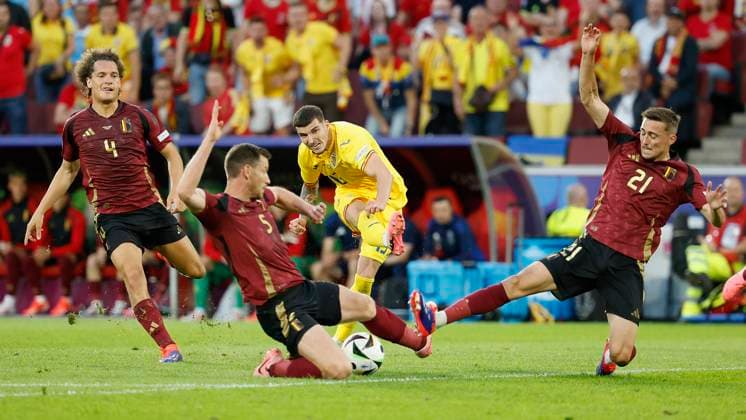 22 06 2024, Football, Euro 2024, Preliminary round, Belgium Romania, GER, Cologne, Cologne Stadium Picture from left Wout Faes Belgium, 4 , Jan Vertonghen Belgium, 5 , Valentin Mihaila Romania, 13 and Timothy Castagne Belgium, 21 Copyright: HMBxMedia xHeikoxBecker