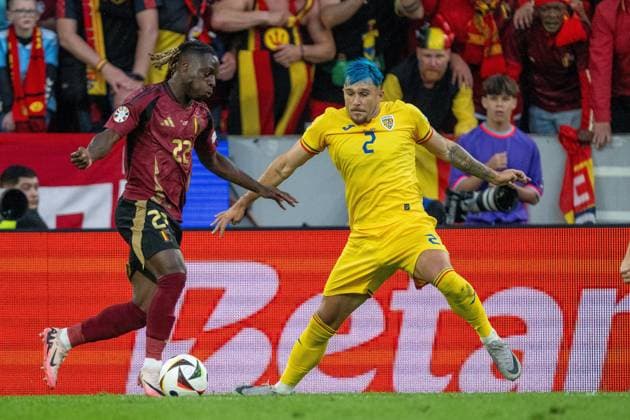 GER, EURO 2024, Group E, Belgium BEL vs Romania ROU 22 06 2024, Cologne Stadium, Cologne, GER, EURO 2024, Group E, Belgium BEL vs Romania ROU In the picture Andrei Ratiu Romania ROU, 02 Jeremy Doku Belgium BEL, 22 in duel, duel, dynamics, action, action, game scene gestures, facial expressions, emotions ball at the foot game scene nordphotoxGmbHxx xDenkinger nph00015