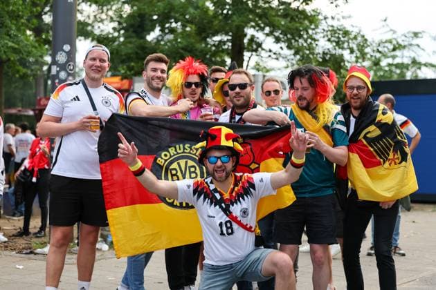 Germany fans, soccer, national team, EM 2024, Germany, group stage, fans, enthusiasm, German flags, fan outfits, costumes, hats, fan accessories, cheering, joy, stadium atmosphere, sporting event, outdoor, lettering, banner, black red gold, mood, Anticipation, fan articles, German national team, stadium, fan chants, soccer fever, emotions, football, UEFA, European Championship, Group A 2024, Switzerland vs Germany, 23 06 2024, Frankfurt Arena, Frankfurt, Germany Frankfurt Frankfurt Arena Hessen Germany Copyright: xGrantxHubbsx