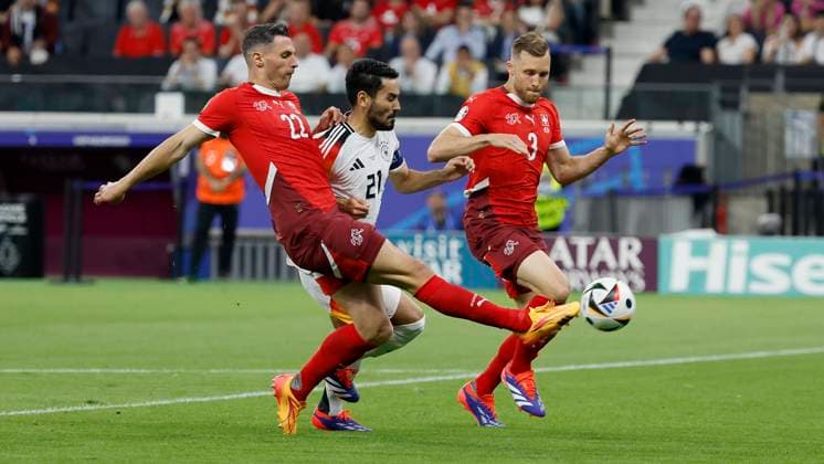 23 06 2024, Football, Euro 2024, Preliminary round, Switzerland - Germany, GER, Frankfurt, Stadium Picture from left Fabian Schaer Switzerland, 22 , Ilkay Guendogan Germany, 21 and Silvan Widmer Switzerland, 3 Copyright: HMBxMedia xHeikoxBecker