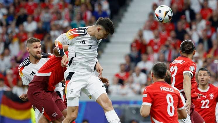 23 06 2024, Football, Euro 2024, Preliminary round, Switzerland - Germany, GER, Frankfurt, Stadium picture from left Manuel Akanji Switzerland, 5 and Kai Havertz Germany, 7 with a header, Copyright: HMBxMedia xHeikoxBecker