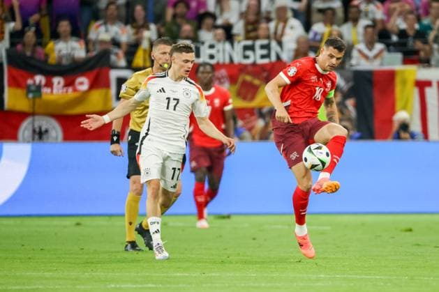 Granit Xhaka Switzerland, 10 and Florian Wirtz GER, 17 in action , Football, UEFA , European Championship, Group A 2024, Switzerland vs Germany, 23 06 2024, Frankfurt Arena, Frankfurt, Germany Frankfurt Frankfurt Arena Hessen Germany Copyright: xGrantxHubbsx