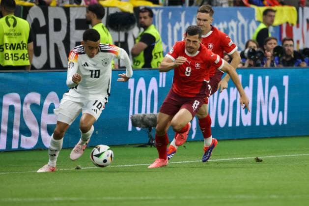 Jamal Musiala GER, 10 with Remo Freuler Switzerland, 08 , Football, UEFA , European Championship, Group A 2024, Switzerland vs Germany, 23 06 2024, Frankfurt Arena, Frankfurt, Germany Frankfurt Frankfurt Arena Hessen Germany Copyright: xGrantxHubbsx