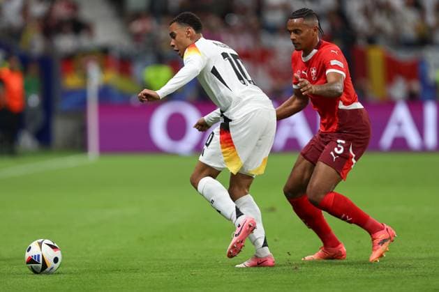 Jamal Musiala Germany and Manuel Akanji Switzerland in a duel, UEFA EURO 2024 Group A, Switzerland vs Germany, Arena Frankfurt on June 23, 2024 in Frankfurt am Main, Germany Photo by Oliver Kaelke DeFodi Images Jamal Musiala Germany and Manuel Akanji Switzerland battle for the ball, UEFA EURO 2024 Group A, Switzerland vs Germany, Arena Frankfurt on June 23, 2024 in Frankfurt am Main, Germany Photo by Oliver Kaelke DeFodi Images Defodi 678 2024 06 23 OK SUIGER 0739 Defodi-678